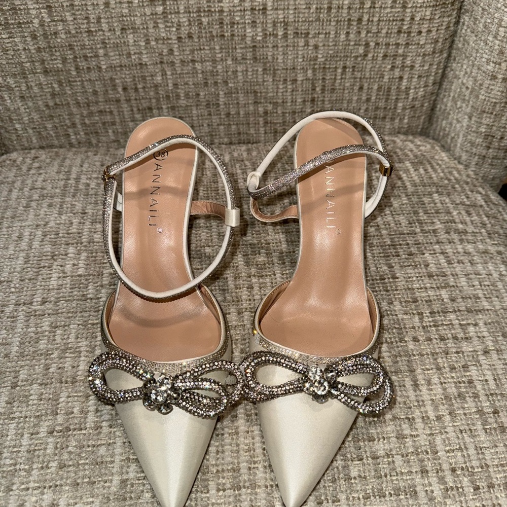 Elegant White Pointed Toe Heels with Ankle Strap